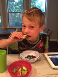 My son Weston enjoying an avocado for breakfast